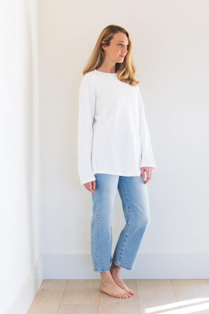 No exaggeration here; this is the ultimate long sleeve tee. Fitting loose on your frame with a drop-shoulder design and a gentle curve at the hem, this essential piece is effortless to pair and wear, with simple care instructions and understated details throughout. Monikered with the PRIV seal between the shoulder-blades on soft waffle texture fabric. 

