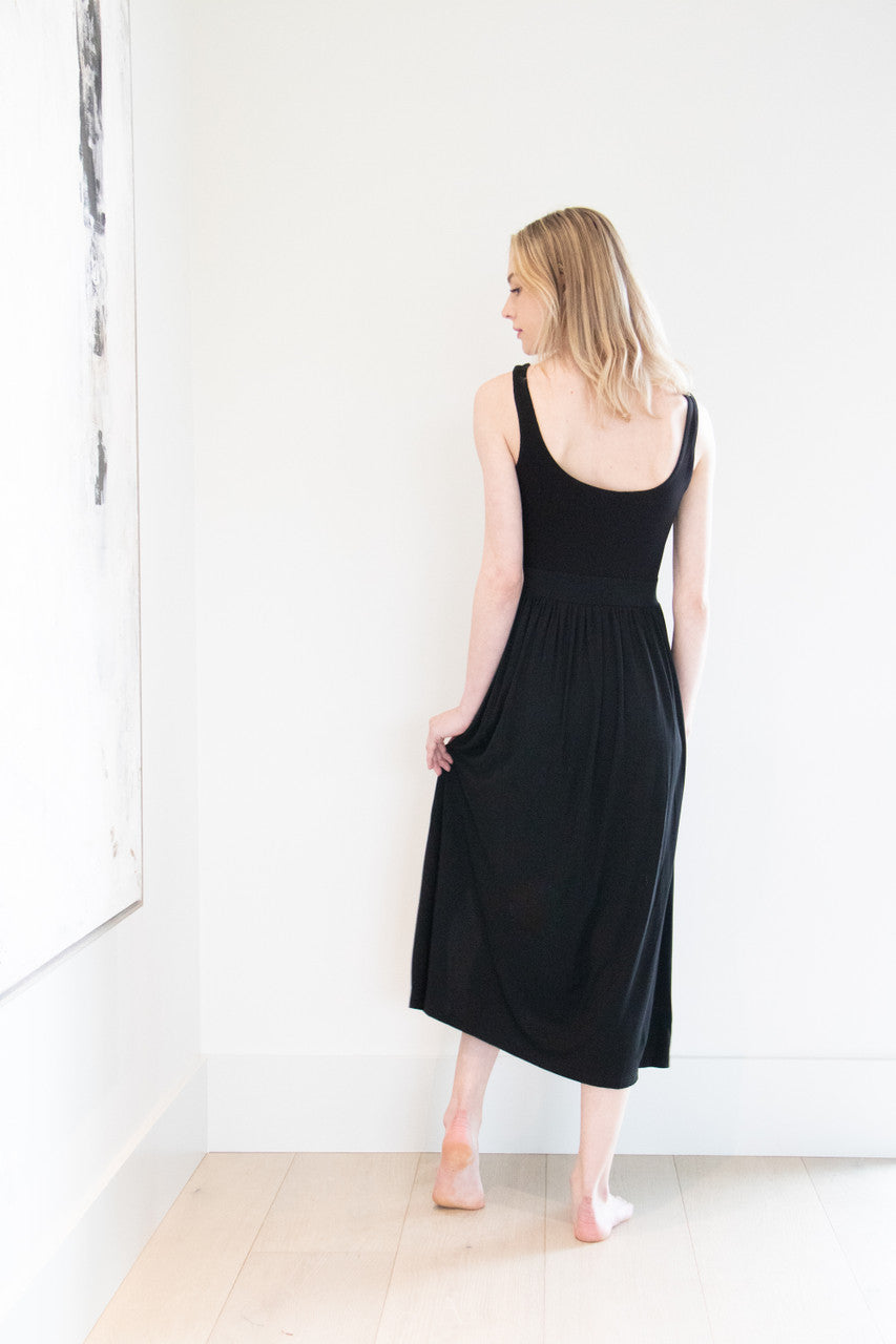 Made with a flattering silhouette and scooped neckline, ribbed chest fabric, the perfect amount of stretch and a side split to mid thigh. Viscose based fabric has a soft, flowing quality - easy to wear casually and effortless to elevate for something more formal. 
