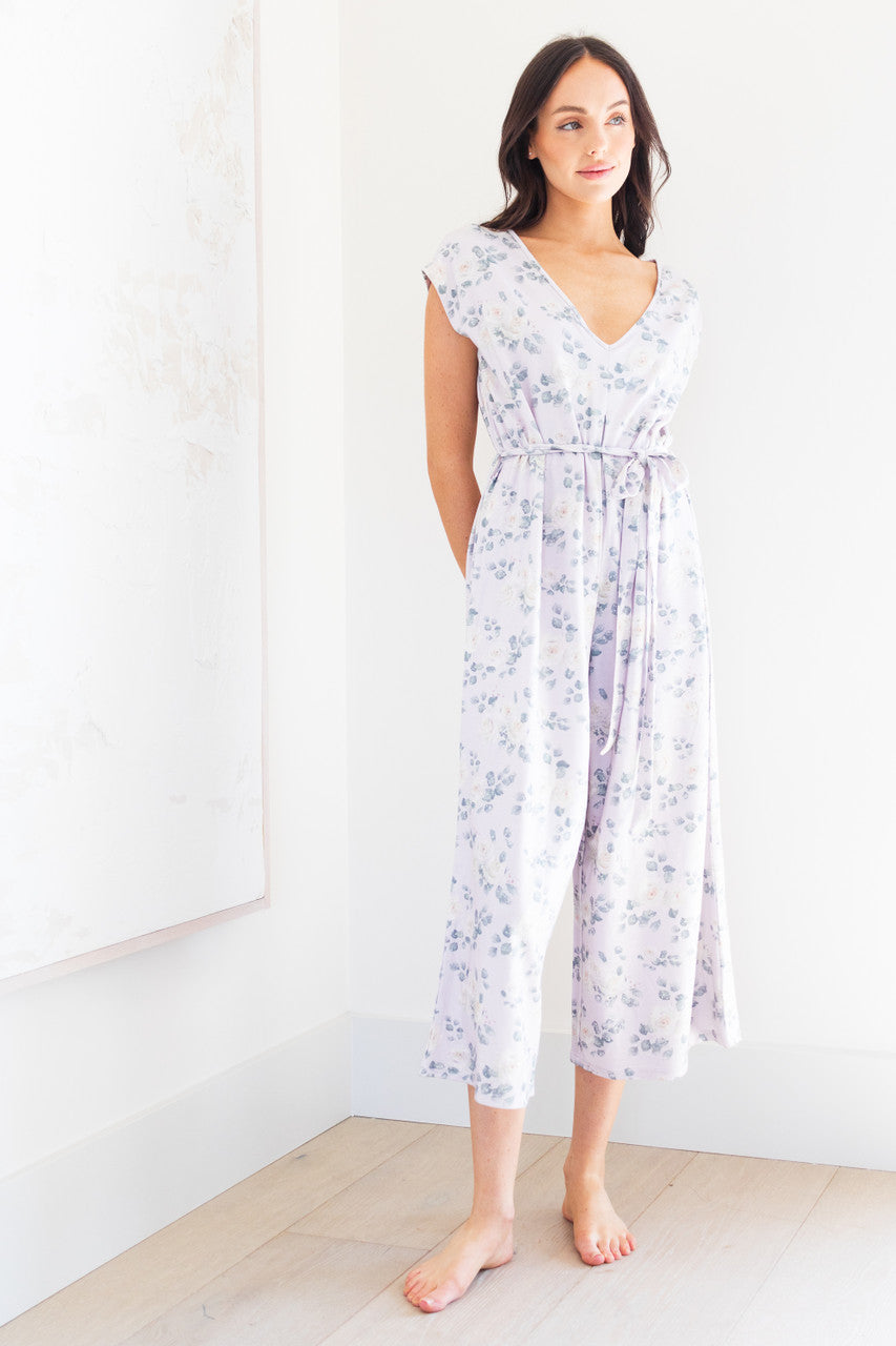 Introducing our white rose print women's romper, made from soft lilac modal fabric. Featuring a tie waist and delicate floral pattern, this romper is both comfortable and stylish. Perfect for any occasion, dress it up or down for a versatile addition to your wardrobe. 
