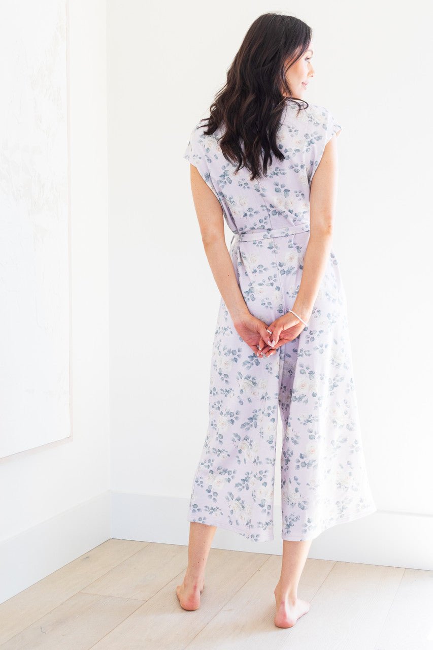 Introducing our white rose print women's romper, made from soft lilac modal fabric. Featuring a tie waist and delicate floral pattern, this romper is both comfortable and stylish. Perfect for any occasion, dress it up or down for a versatile addition to your wardrobe. 
